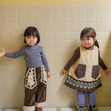 Amber Novelli embroidered one-piece